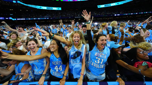 Apr 2, 2022; New Orleans, LA, USA; North Carolina Tar Heels fans celebrate after defeating the Duke Blue Devils during the 2022 NCAA men's basketball tournament Final Four semifinals at Caesars Superdome. Mandatory Credit: Andrew Wevers-USA TODAY Sports